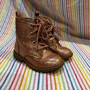 Sparkly pink lace-up boots